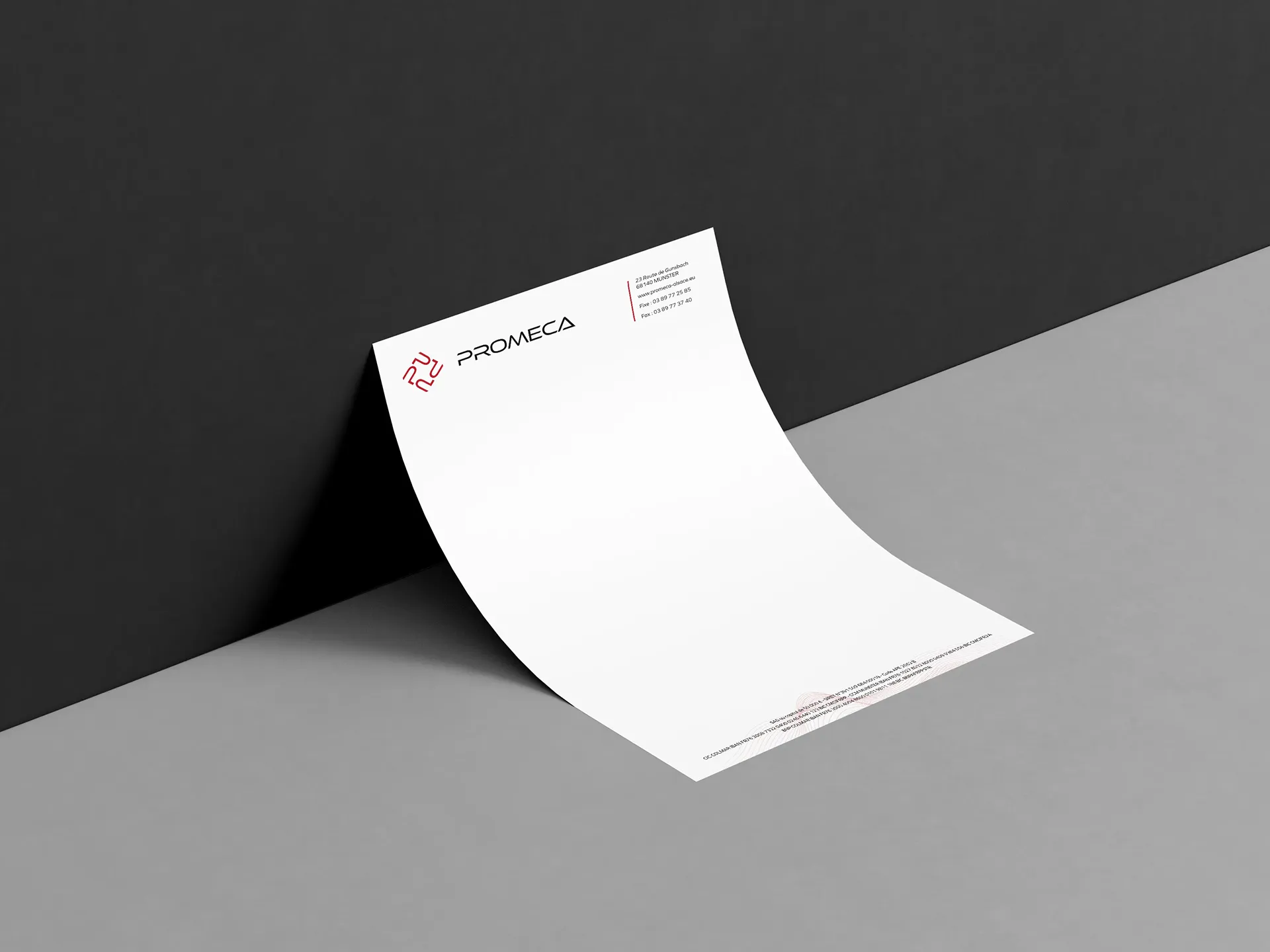 Papier à en-tête Promeca avec logo, coordonnées et identité visuelle rouge et noire sur une feuille A4.